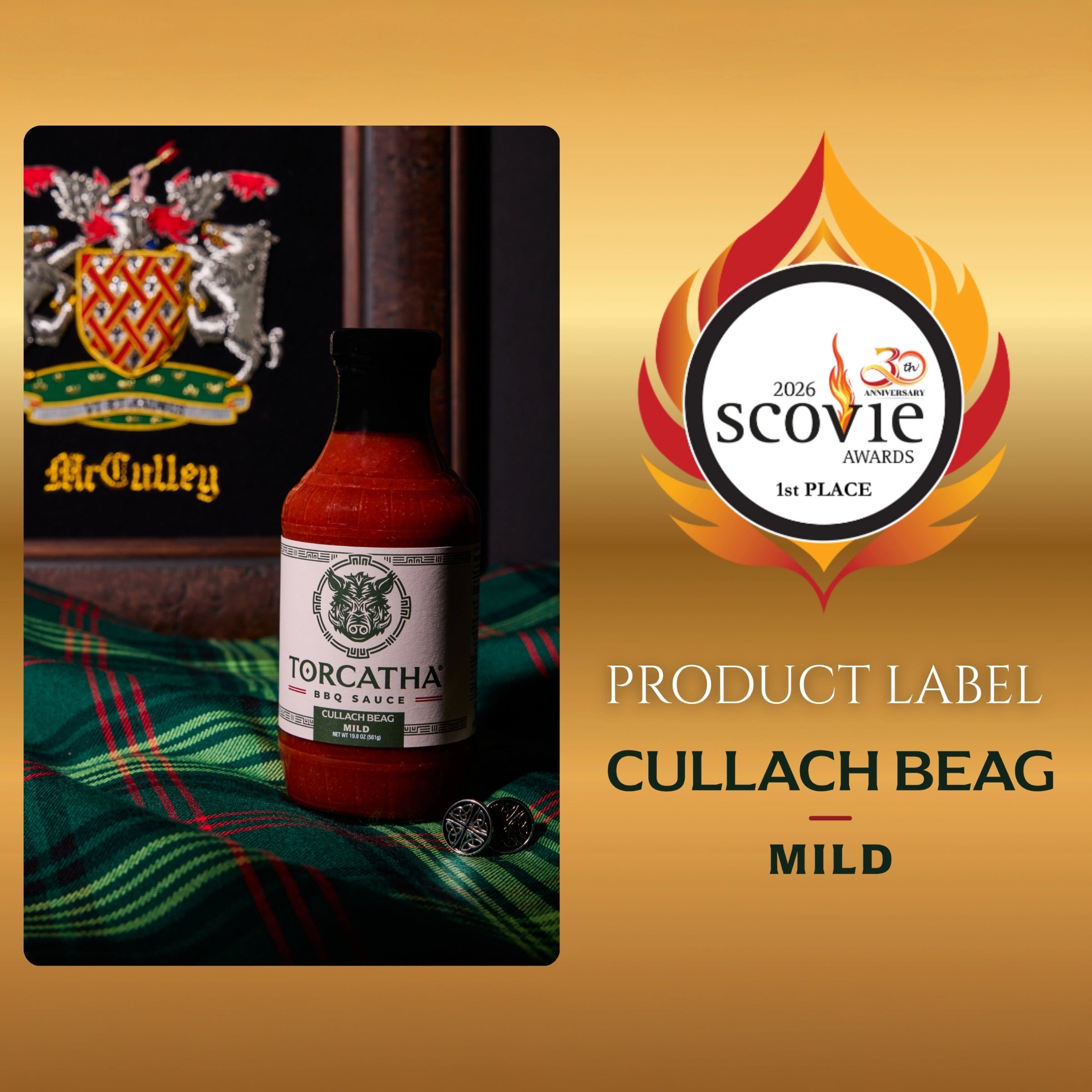 Image of the 2026 Scovie Award, 1st Place Product Label for Cullach Beag Mild BBQ Sauce, shown alongside a bottle of Torcatha BBQ Sauce on a Scottish plaid fabric, with the McCully family crest in the background.