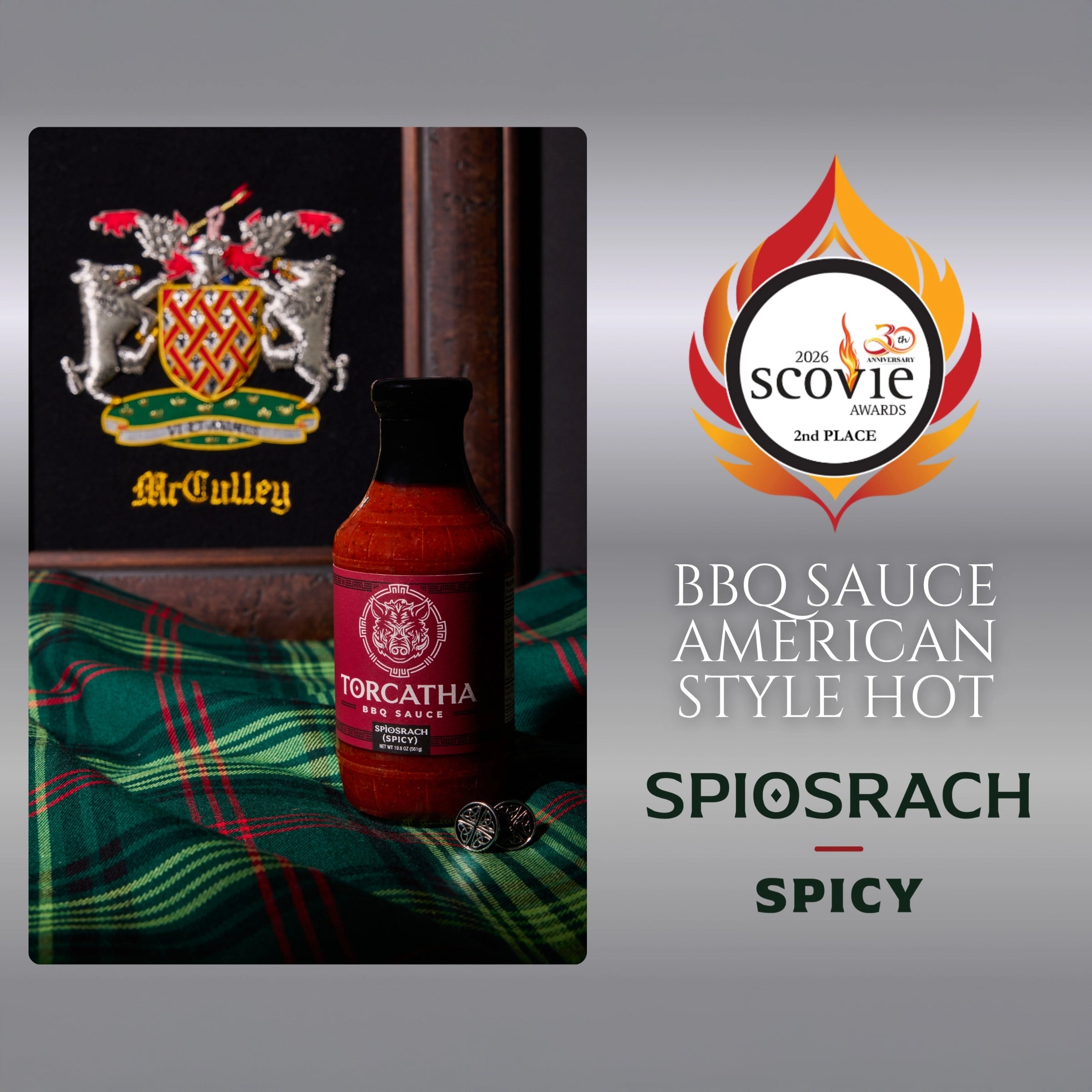 Image of the 2026 Scovie Award, 1st Place Product Label for Cullach Beag Mild BBQ Sauce, shown alongside a bottle of Torcatha BBQ Sauce on a Scottish plaid fabric, with the McCully family crest in the background.