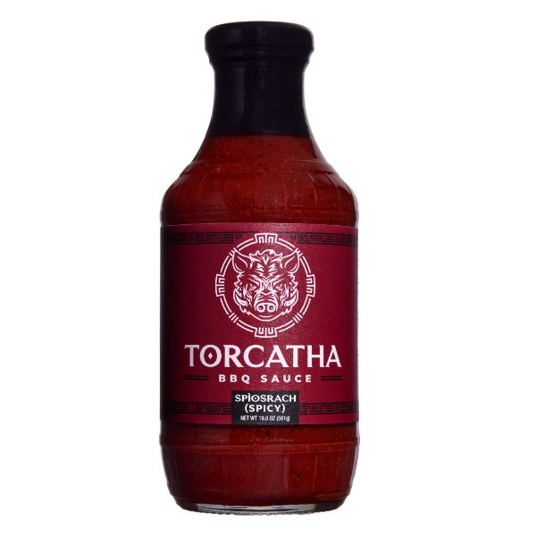 Bottle of Spìosrach (Spicy) Torcatha BBQ Sauce with a red battle boar on the label, an image the Torcatha brand is known for, on a white background.